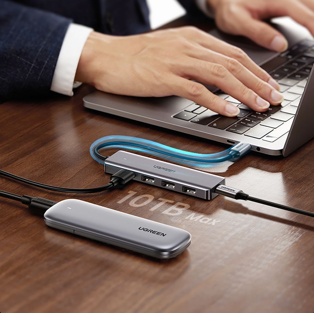 Kaabel Ugreen  HUB Ugreen CM219 35574 with 4 USB-A 3.0 ports and USB-A 3.0 cable 1m - black