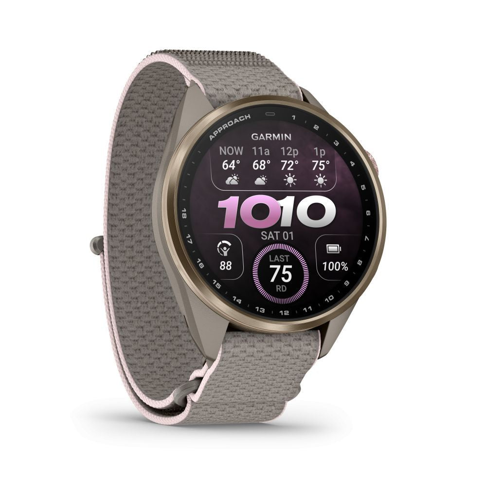 Nutikell Garmin  Approach S72 – 43 mm
Soft Gold/Blush Pink Titanium Bezel with French Grey/Blush Pink ComfortFit Fabric Band